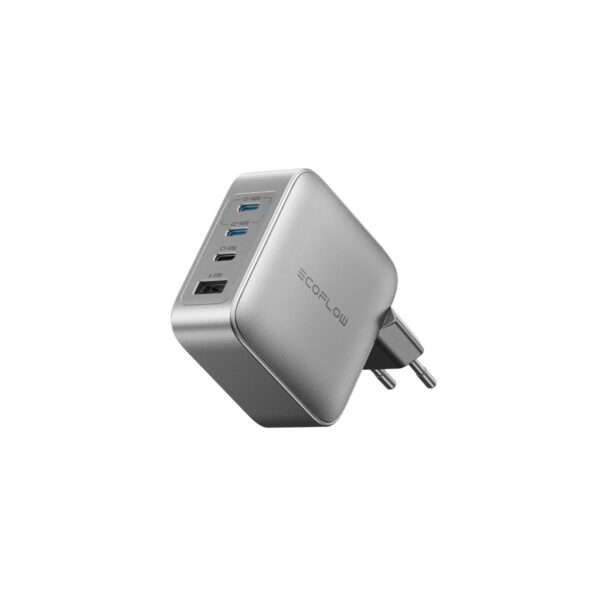 Ein kompakter, grauer Ladeadapter mit mehreren USB-Anschlüssen auf einer Seite und einem Stecker auf der anderen Seite für den Anschluss an eine Steckdose. Das Design ist schlank und modern und eignet sich zum schnellen Aufladen mehrerer Geräte gleichzeitig.